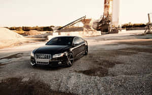 Luxury And Performance - Audi S6 Sedan In Motion Wallpaper