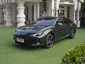 Luxury Green Sedan Front View Wallpaper