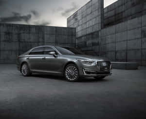 Luxury In Motion: Genesis G90 Sedan At The Iconic Harbor Road Wallpaper