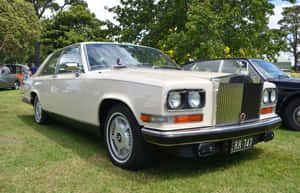 Luxury Redefined - Vintage Rolls Royce Camargue Compelling Profile Wallpaper