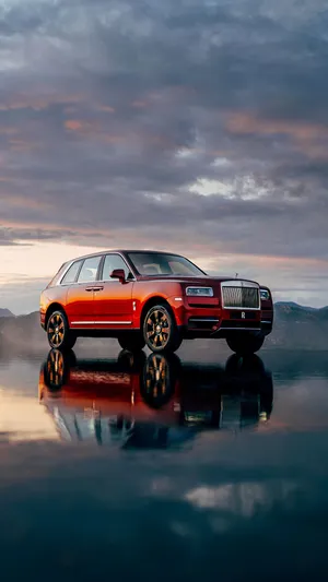 Luxury S U V Sunset Reflection Wallpaper