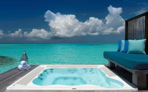 Luxury Seaside Hot Tub Experience Wallpaper