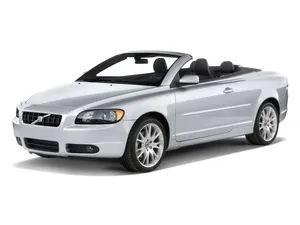 Luxury Volvo C70 Gliding Through The City Streets Wallpaper