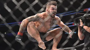 M M A Fighter Celebration Jump Wallpaper