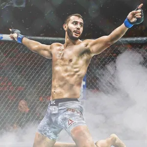 M M A Fighter Victory Celebration Wallpaper