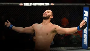 M M A Fighter Victory Celebration Wallpaper