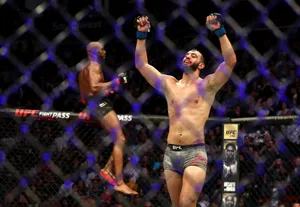 M M A Fighter Victory Celebration Wallpaper