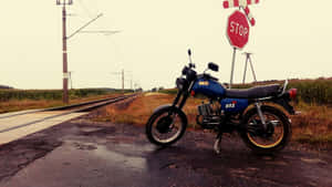 M Z_ E T Z_ Motorcycle_at_ Railroad_ Crossing Wallpaper