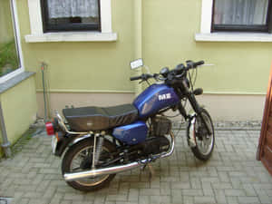 M Z Motorcycle Parked Outside Wallpaper