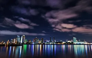 Macbook Pro Glowing Cityscape Wallpaper