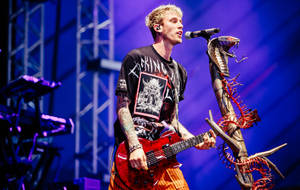 Machine Gun Kelly On Stage Wallpaper