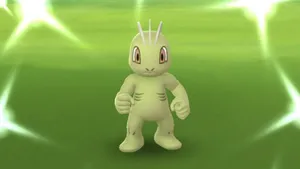 Machop Pokemon On Green Background Wallpaper