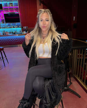 Mackenzie Porter Smiling Casuallyat Venue Wallpaper