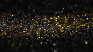 Macro Black And Gold Glitter Particles Wallpaper