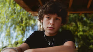 Maddox Batson Casual Portrait Wallpaper