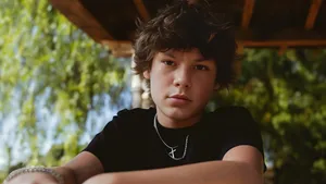 Maddox Batson Casual Portrait Wallpaper