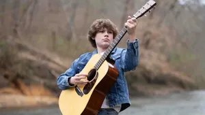 Maddox Batson Playing Guitar Wallpaper