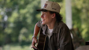 Maddox Batson Playing Guitar Wallpaper