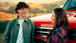 Maddox Batson Smiling Outdoors Wallpaper