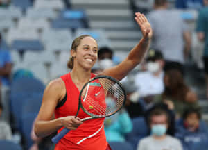 Madison Keys Powerfully Strikes A Tennis Ball Wallpaper