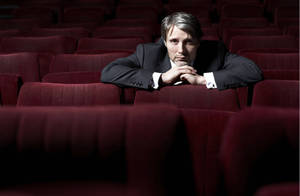 Mads Mikkelsen Photoshoot In Theater Wallpaper