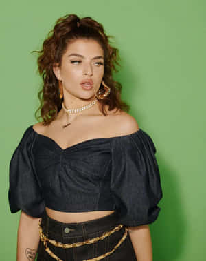 Mae Muller Glowing In The Spotlight Wallpaper