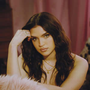 Mae Muller Performing Live On Stage Wallpaper