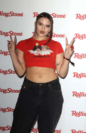 Mae Muller Performing Live On Stage Wallpaper