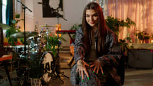 Mae Muller Performing Live On Stage Wallpaper