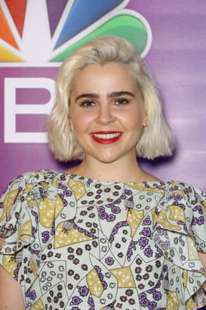 Mae Whitman Posing At A Photoshoot Wallpaper