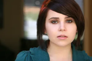 Mae Whitman Posing For A Portrait Session Wallpaper