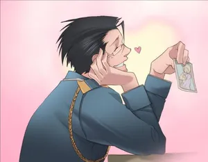 Maes Hughes Smiling And Holding A Phone Wallpaper