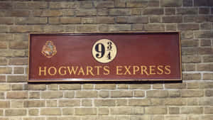 Magic Awaits At Platform 9 3/4 Of King's Cross Station Wallpaper