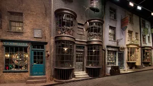 Magical Diagon Alley Bustling With Shoppers And Wizards Wallpaper