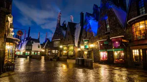 Magical Evening In Hogsmeade Village Wallpaper