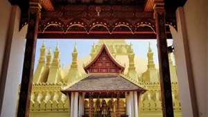Magnificent Entrance Of Pha That Luang In Vientiane Wallpaper