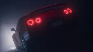 Magnificent Nissan Gt-r In Mystical Fog Wallpaper