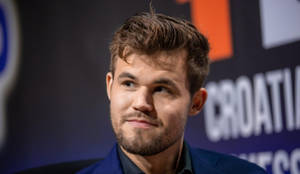 Magnus Carlsen Charming Smile Wallpaper