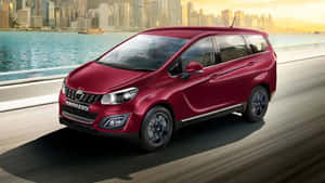 Mahindra Marazzo Red Model Coastal Road Wallpaper