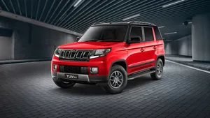 Mahindra Suv On A Scenic Mountain Getaway Wallpaper