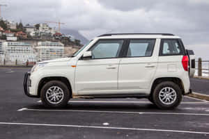 Mahindra T U V300 Side View Parked Wallpaper