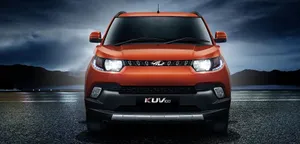 Mahindra Xuv500 On A Picturesque Mountain Road Wallpaper