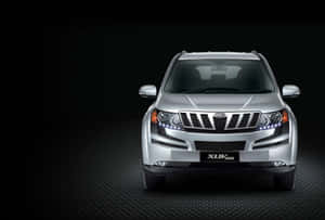 Mahindra Xuv500 On A Scenic Route Wallpaper