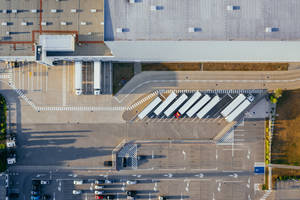 Majestic Aerial View Of Semi Container Trucks Wallpaper