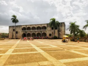 Majestic Alcazar De Colon Under A Cloudy Sky Wallpaper