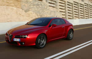 Majestic Alfa Romeo Brera In A Breathtaking Scenery Wallpaper