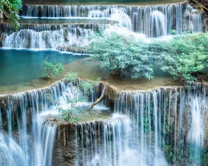 Majestic Aurora Borealis Over A Serene Landscape Wallpaper