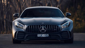 Majestic Black Amg Gt R Glowing Under The City Lights Wallpaper