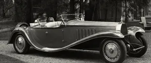 Majestic Bugatti Type 41 Royale On Display Wallpaper