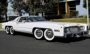 Majestic Cadillac Eldorado Cruising The Streets Wallpaper